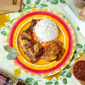 Image of chicken, rice, and fried plantains.